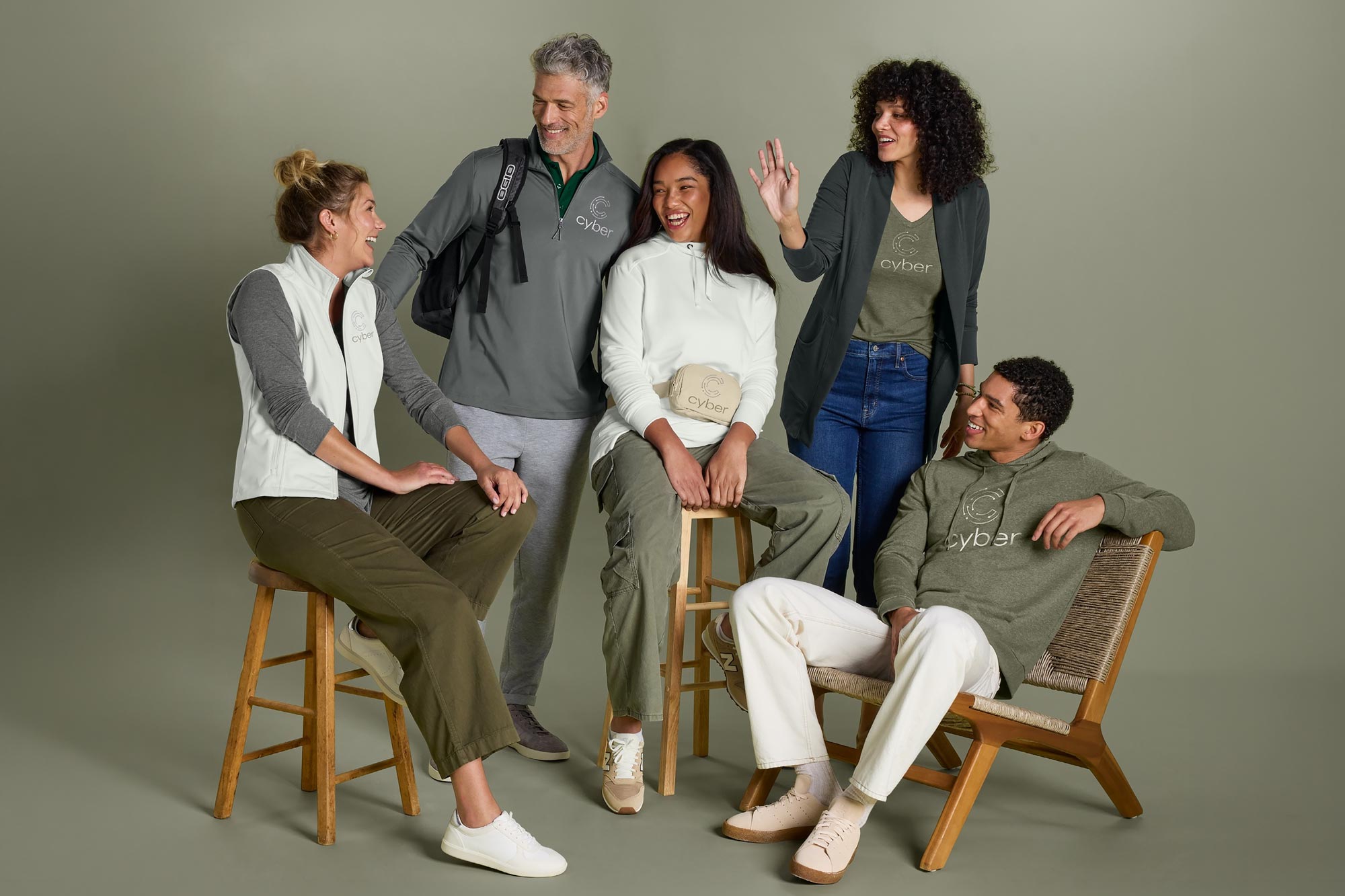 Group of business people in casual branded apparel
